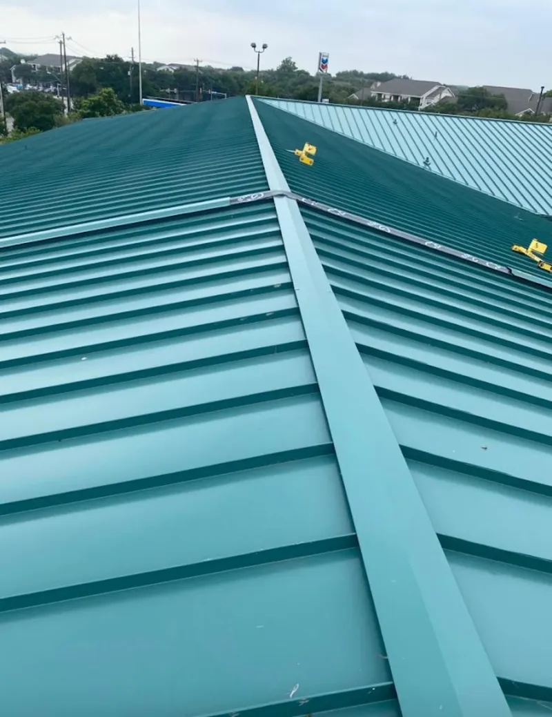 Green commercial metal roof ridge and valley for Metal Roof Repair in Stuart